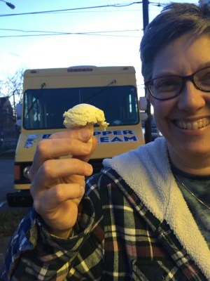 A tiny, perfect ice cream cone, about an inch tall
