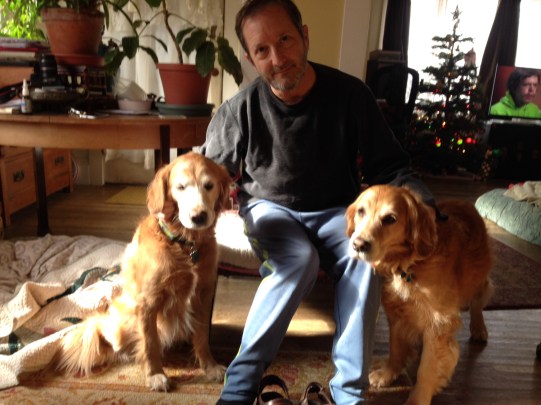  Dora, left, and Cali, right, sit with Dora's dad