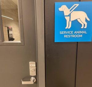 Missoula's SARA has a blue-and-white sign indicating it's a Service Animal Restroom and a privacy lock on the door